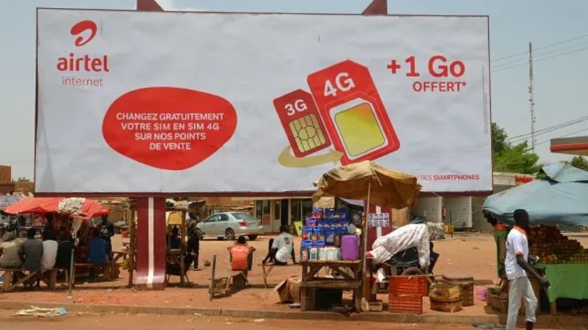 Airtel logo signage on a building exterior indicating the companys presence and branding in a bustling urban area