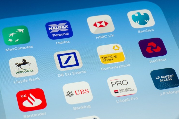 Mobile banking apps interface with charts and notifications on a smartphone, highlighting digital financial management trends