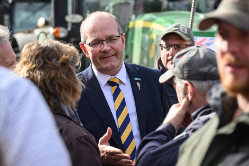 Tom Bradshaw addressing National Farmers Union members at a conference, discussing agricultural policies and challenges.