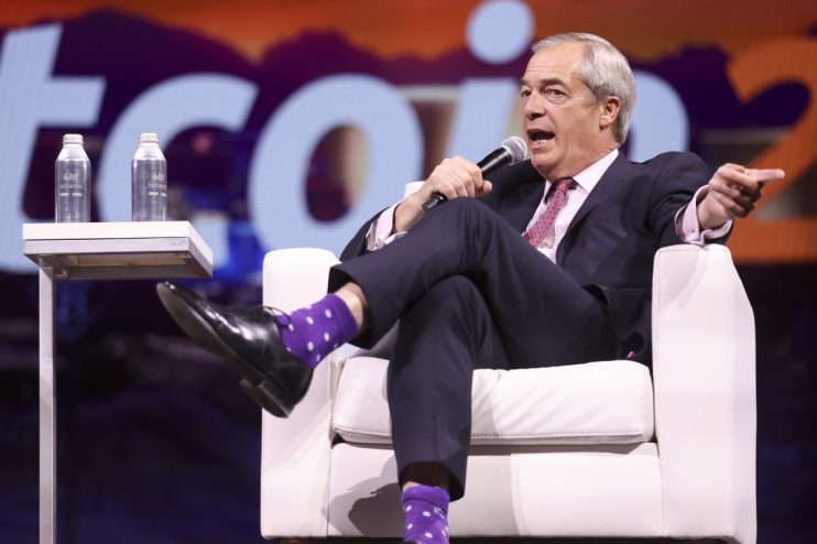 Nigel Farage discussing Bitcoin investment at a business conference, emphasizing cryptocurrencys role in modern finance