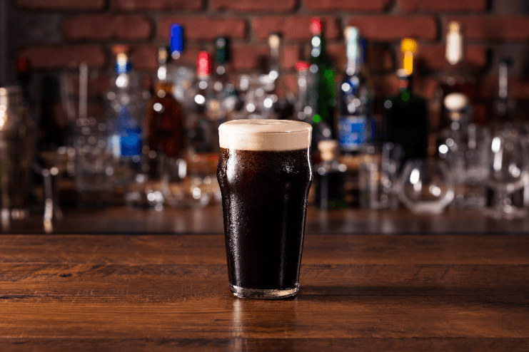 London pub scene with a pint of beer costing &pound;10, highlighting rising prices in the city drinking establishments