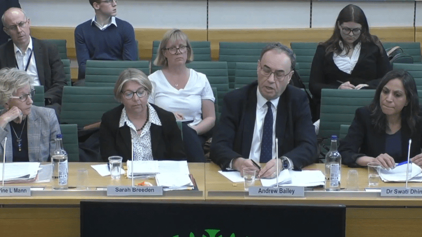 Bank of England officials addressing the Treasury Committee during a meeting, discussing economic policies and financial o...