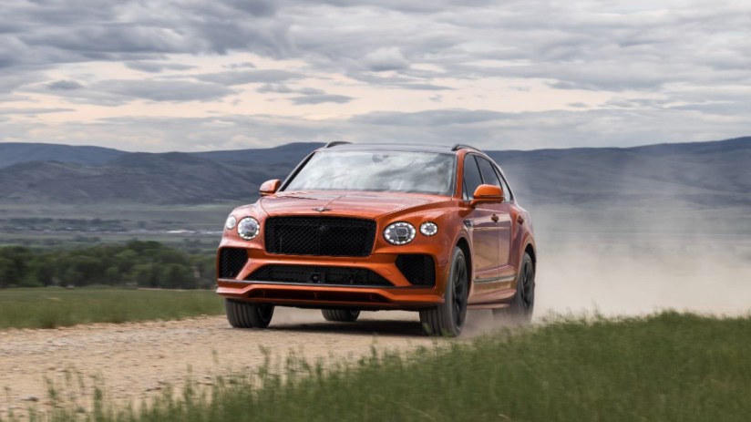 Bentley Bentayga luxury SUV showcasing sleek design, premium features, and advanced technology in a dynamic urban setting