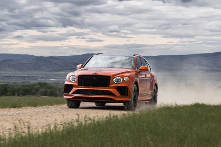 Bentley Bentayga luxury SUV showcasing sleek design, premium features, and advanced technology in a dynamic urban setting