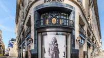 Burberry fashion show runway featuring models in luxury attire showcasing the latest collection in an elegant setting