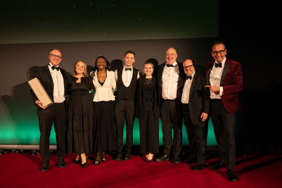 Morning Wire Awards ceremony stage with Starling Bank branding and award-winning engine display in a corporate setting