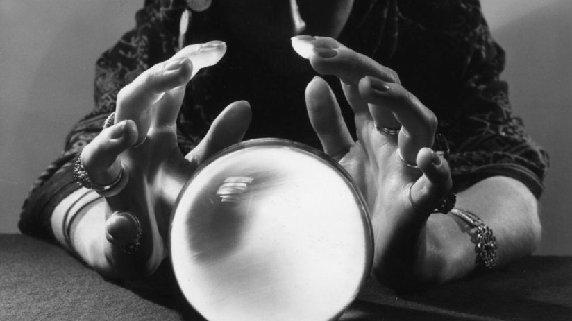 Crystal ball symbolizing prediction markets in a business context, reflecting future forecasting and financial trends.
