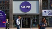 Currys storefront with prominent logo and modern exterior design, reflecting its role as a leading electronics retailer