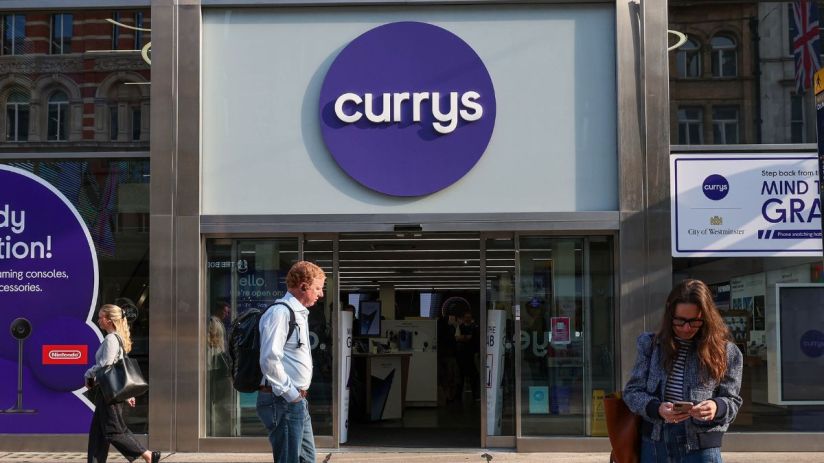 Currys storefront with prominent logo and modern exterior design, reflecting its role as a leading electronics retailer