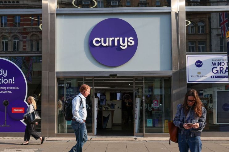 Currys storefront with prominent logo and modern exterior design, reflecting its role as a leading electronics retailer