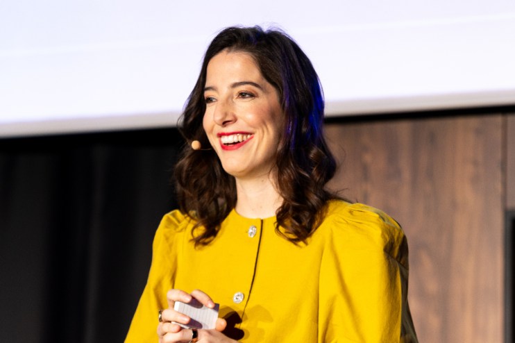 Eleonore Crespo, CEO of Pigment, confidently leading a business meeting in a modern office setting