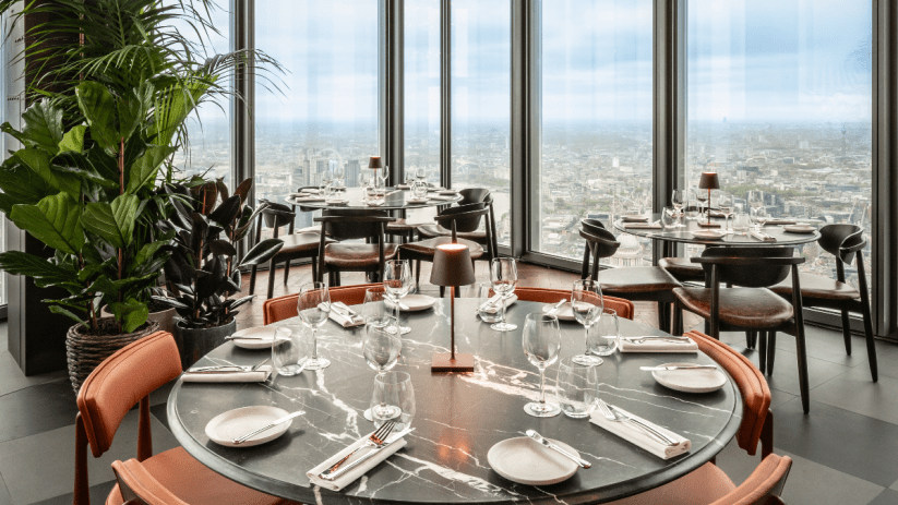 Gordon Ramsay dining experience at Bishopsgates Bread Street Kitchen bustling with patrons enjoying gourmet dishes