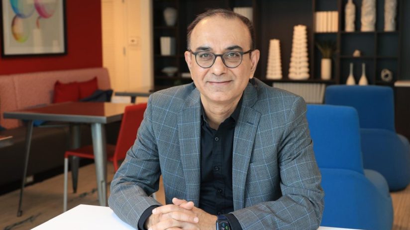 Harshul Asnani from Tech Mahindra discusses company strategy and innovation in a business meeting setting