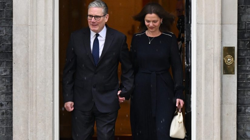 Keir Starmer stands outside 10 Downing Street amid calls for resignation, looking serious and contemplative