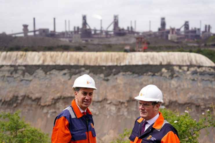 Keir Starmer discussing future of British Steel at a press conference, emphasizing economic policies and steel industry im...