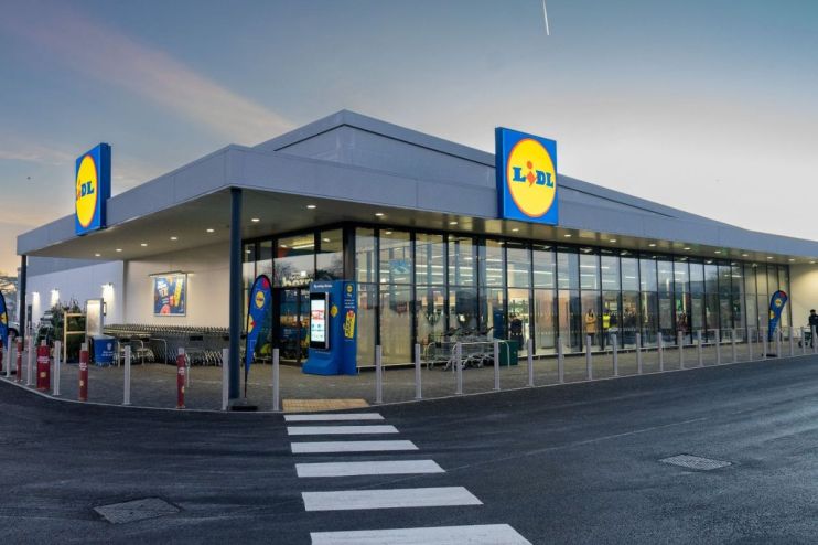Lidl store entrance with shopping carts and customers entering on a busy day