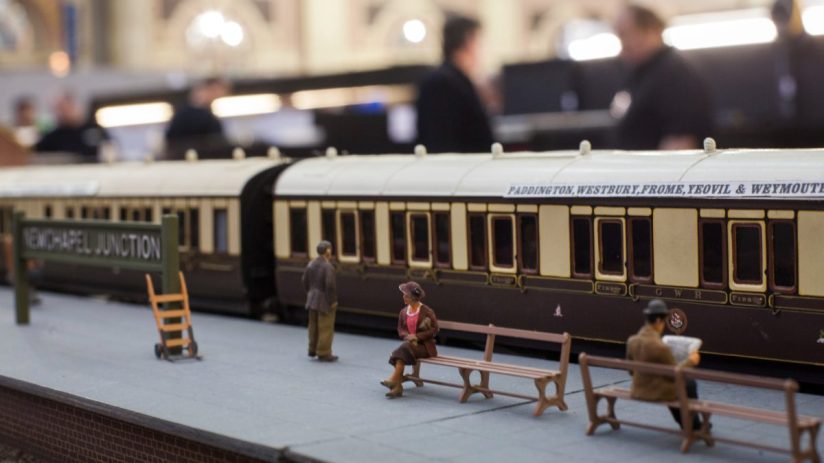 Detailed model railway set showcasing intricate train tracks and miniature landscapes for hobby enthusiasts.