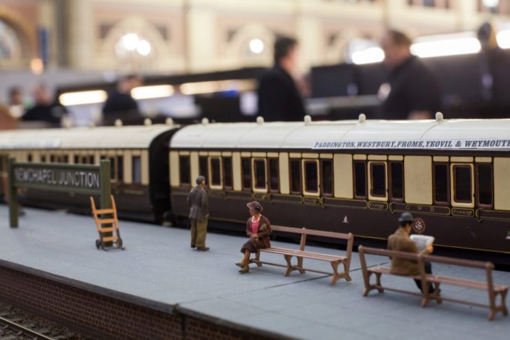 Detailed model railway set showcasing intricate train tracks and miniature landscapes for hobby enthusiasts.