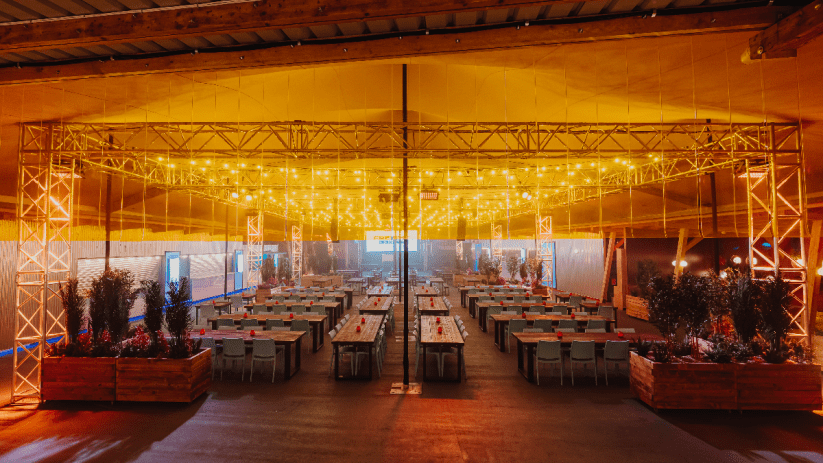 Freight Brixton rooftop bar in New London with city skyline views, modern decor, and patrons enjoying cocktails at sunset
