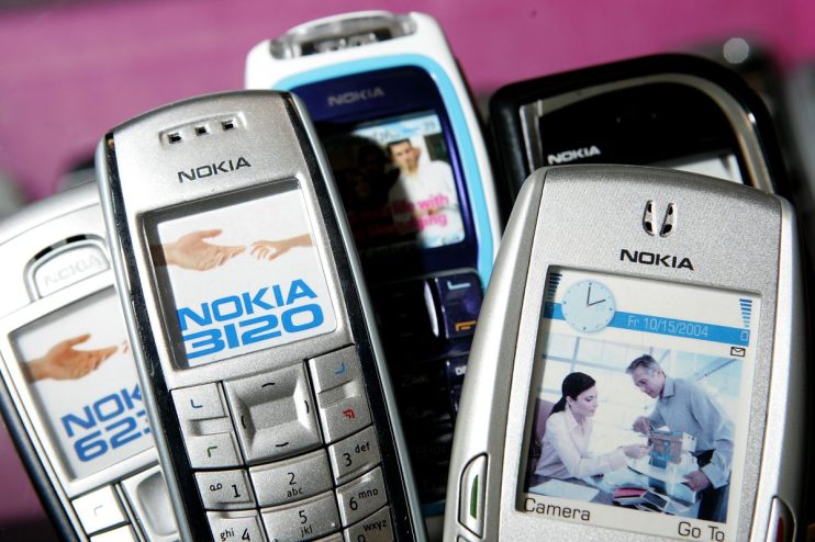 Nokia dump phone showcasing classic design and durable build, highlighting nostalgia in modern tech market.