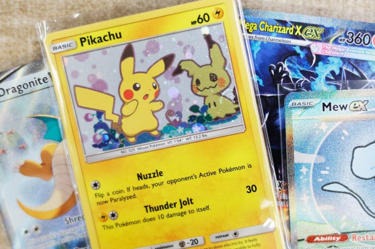 Rare Pokemon trading card featuring Pikachu in mint condition displayed on a clean surface, highlighting collectible value.