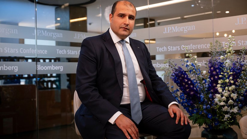 Quantexa CEO Vishal Marria speaking at a business conference, addressing data analytics and company growth strategies.