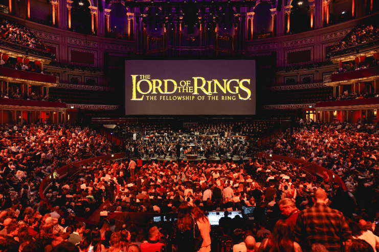 Royal Albert Hall illuminated for Films in Concert series, showcasing iconic movie scenes and live orchestral performances