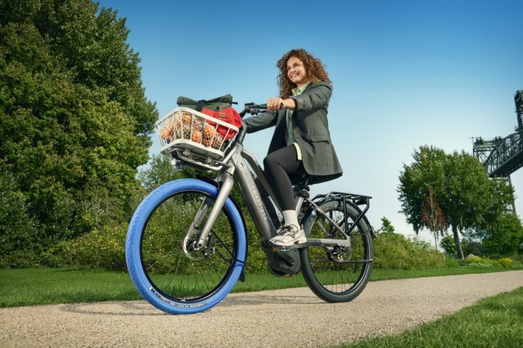 Swapfiets PowerPlus electric bike in urban setting, showcasing sleek design and modern features for sustainable commuting