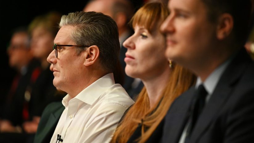 Wes Streeting, Angela Rayner, and Keir Starmer engaged in a discussion at a political event, with a focus on Labour Party ...