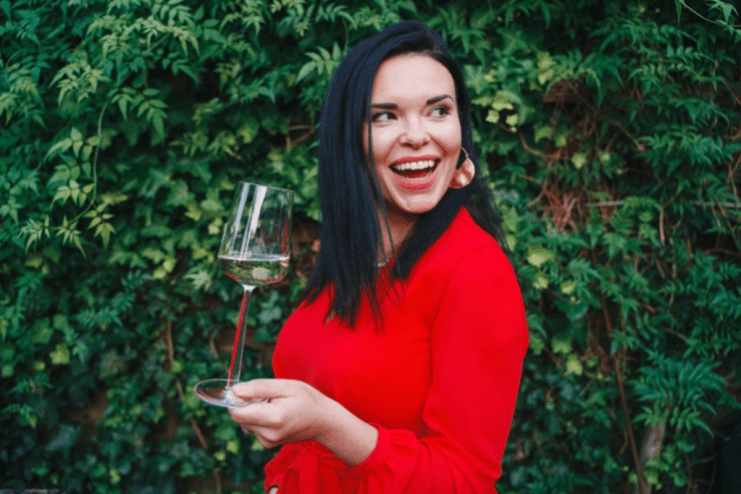 Wine and music enthusiasts enjoying a vibrant London event, featuring wine tasting and live performances in a lively setting.
