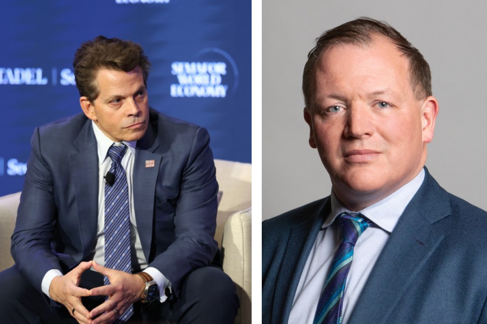 Anthony Scaramucci speaking at the Festival of Words, surrounded by an engaged audience in a business conference setting