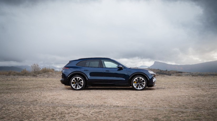 Porsche Cayenne SUV parked on urban street showcasing sleek design and luxury automotive features