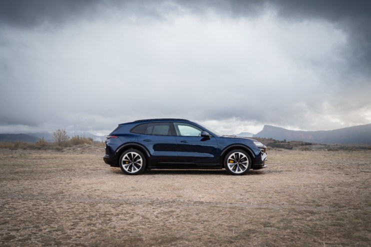 Porsche Cayenne SUV parked on urban street showcasing sleek design and luxury automotive features