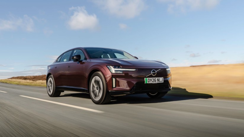 Volvo ES90 electric sedan showcasing sleek design and advanced features in a cityscape setting