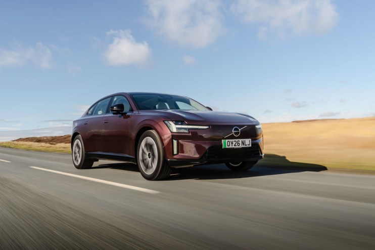 Volvo ES90 electric sedan showcasing sleek design and advanced features in a cityscape setting