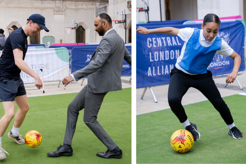 Urban street football game showcasing skilled panna moves in a bustling city setting, highlighting local sports culture.