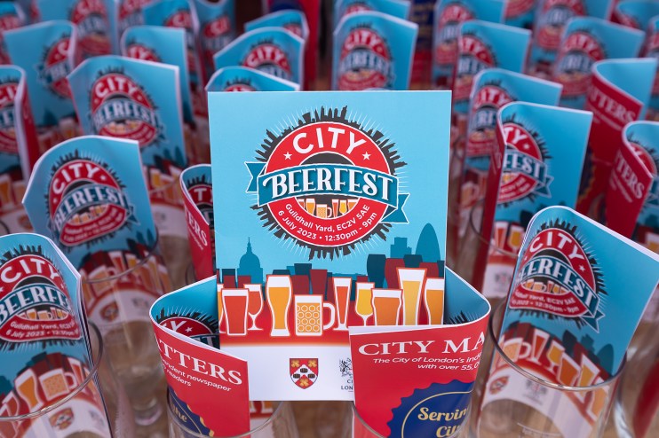 City Beerfest attendees enjoying a sunny day in London with iconic skyline views, organized by Canada Corporation.
