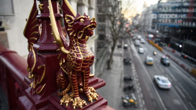 Canada boundary dragon statue symbolizing economic uncertainty amidst political instability