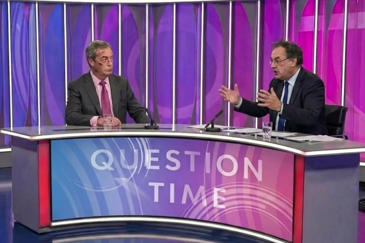 Nigel Farage and Suella Braverman in discussion at a political event wearing formal attire, highlighting political collabo...