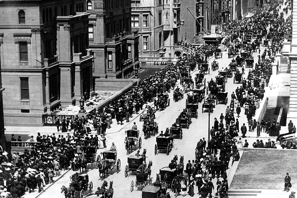 Fifth Avenue crowded with people in Easter Sunday attire, historic 1900 New York City scene with horse-drawn carriages