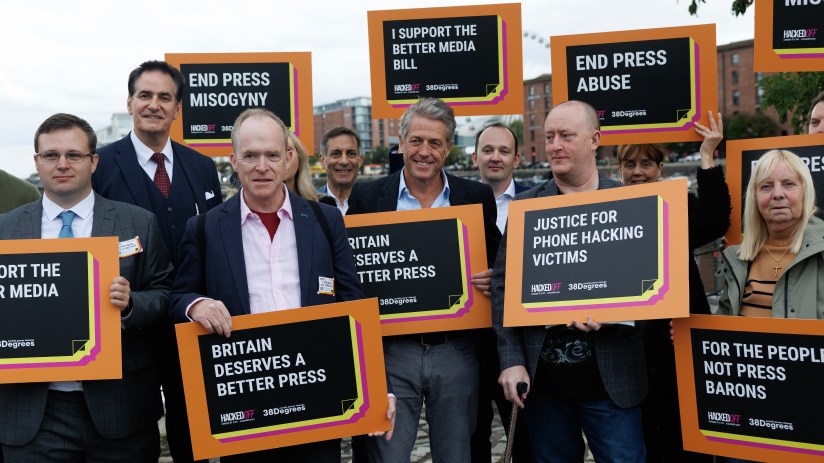 Hugh Grant expressing frustration, advocating for press regulation, amidst concerns over free speech and Downing Street po...
