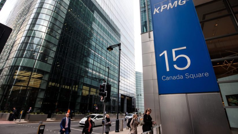 KPMG office building at Canary Wharf showcasing modern architecture and corporate environment.