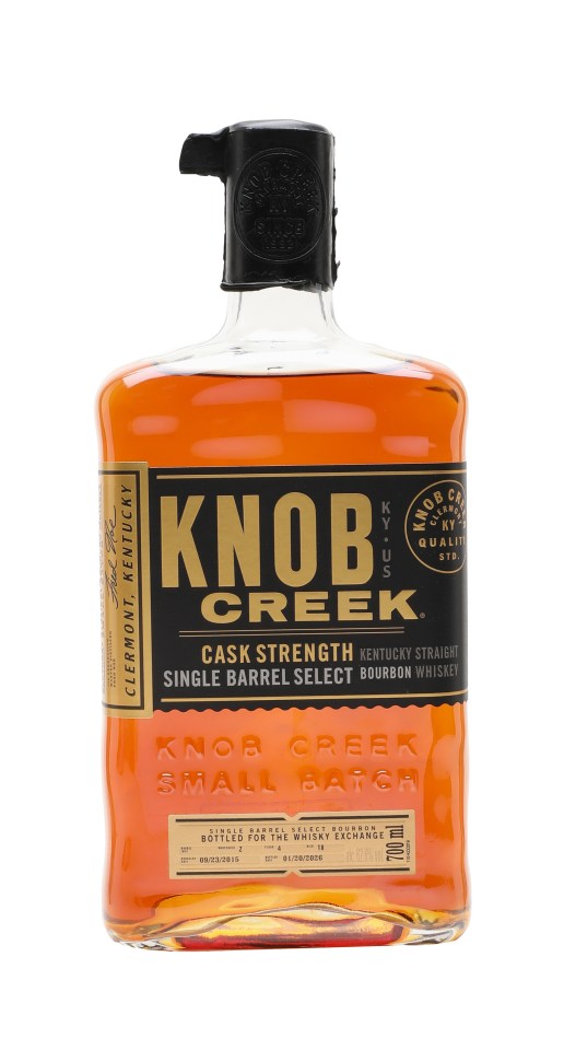 Knob Creek bourbon bottle from 2015 showcasing its label and design, symbolizing premium aged whiskey craftsmanship