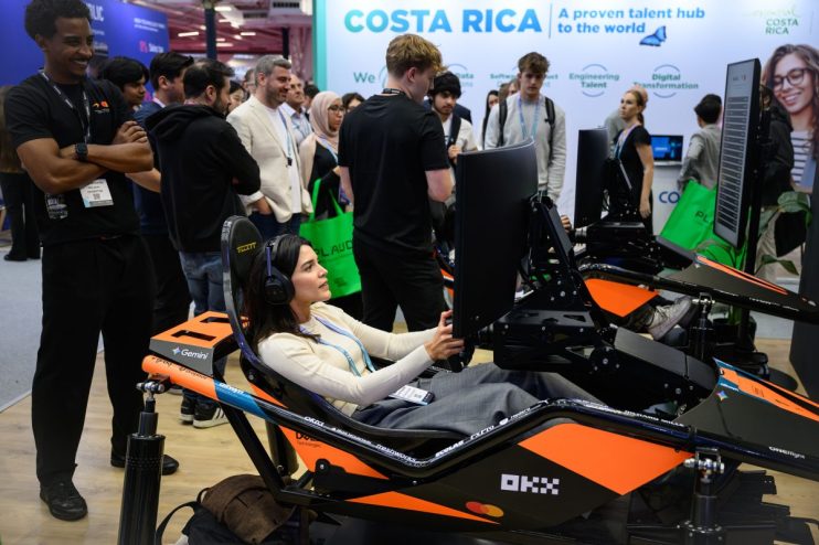Attendees at London Tech Week 2026 conference networking and discussing innovations in technology and business
