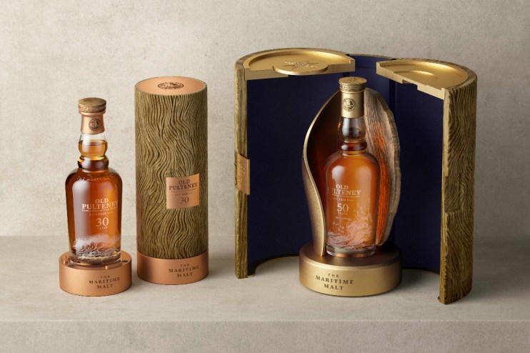 Old Pulteney 50-Year-Old single malt Scotch whisky bottle with elegant packaging on display, highlighting luxury and craft...