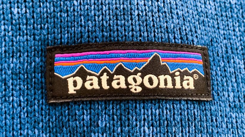 Scenic view of Patagonias rugged landscape with majestic mountains, lush valleys, and clear blue skies, highlighting natur...