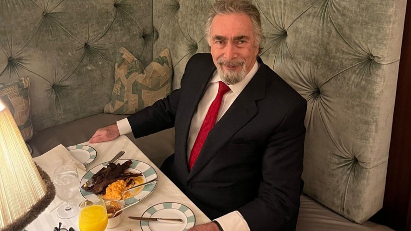 Peter Rosengard seated at his regular table in Claridges, Mayfair, showcasing his daily breakfast routine as a life insura...