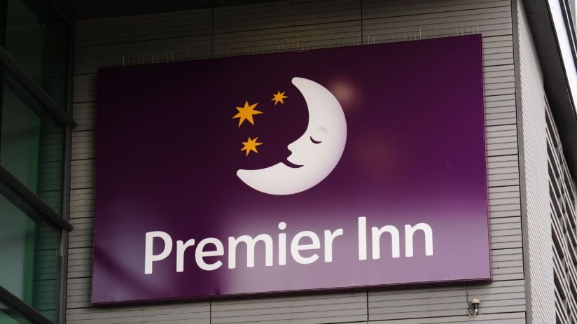 Premier Inn hotel exterior with modern design and welcoming entrance, highlighting its prominent location and accessibility.