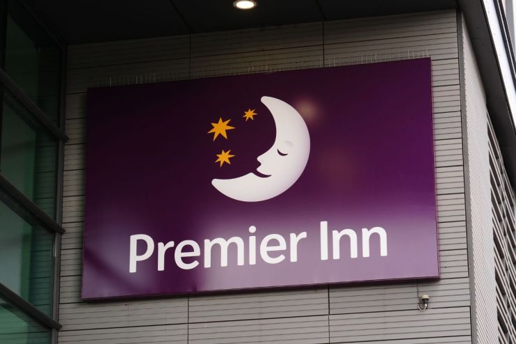 Premier Inn hotel exterior with modern design and welcoming entrance, highlighting its prominent location and accessibility.