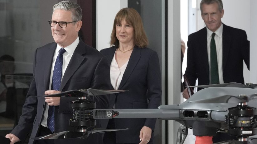 Keir Starmer, Rachel Reeves, and Dan Jarvis discussing Defence Investment Plan funding at a press conference
